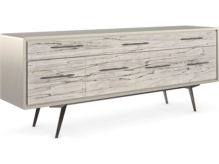 08-2026-SS-F-Caracole Caracole credenza with pale wood-grain drawer fronts, a light gray frame and slim dark metal legs.